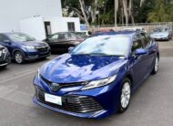 2020 Toyota Camry Ascent Hybrid Sedan in Blue.