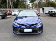 2020 Toyota Camry Ascent Hybrid Sedan in Blue.