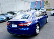 2020 Toyota Camry Ascent Hybrid Sedan in Blue.