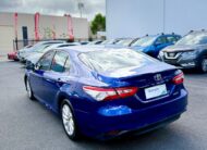 2020 Toyota Camry Ascent Hybrid Sedan in Blue.