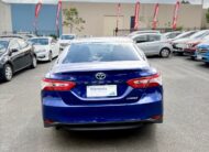 2020 Toyota Camry Ascent Hybrid Sedan in Blue.