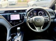 2020 Toyota Camry Ascent Hybrid Sedan in Blue.