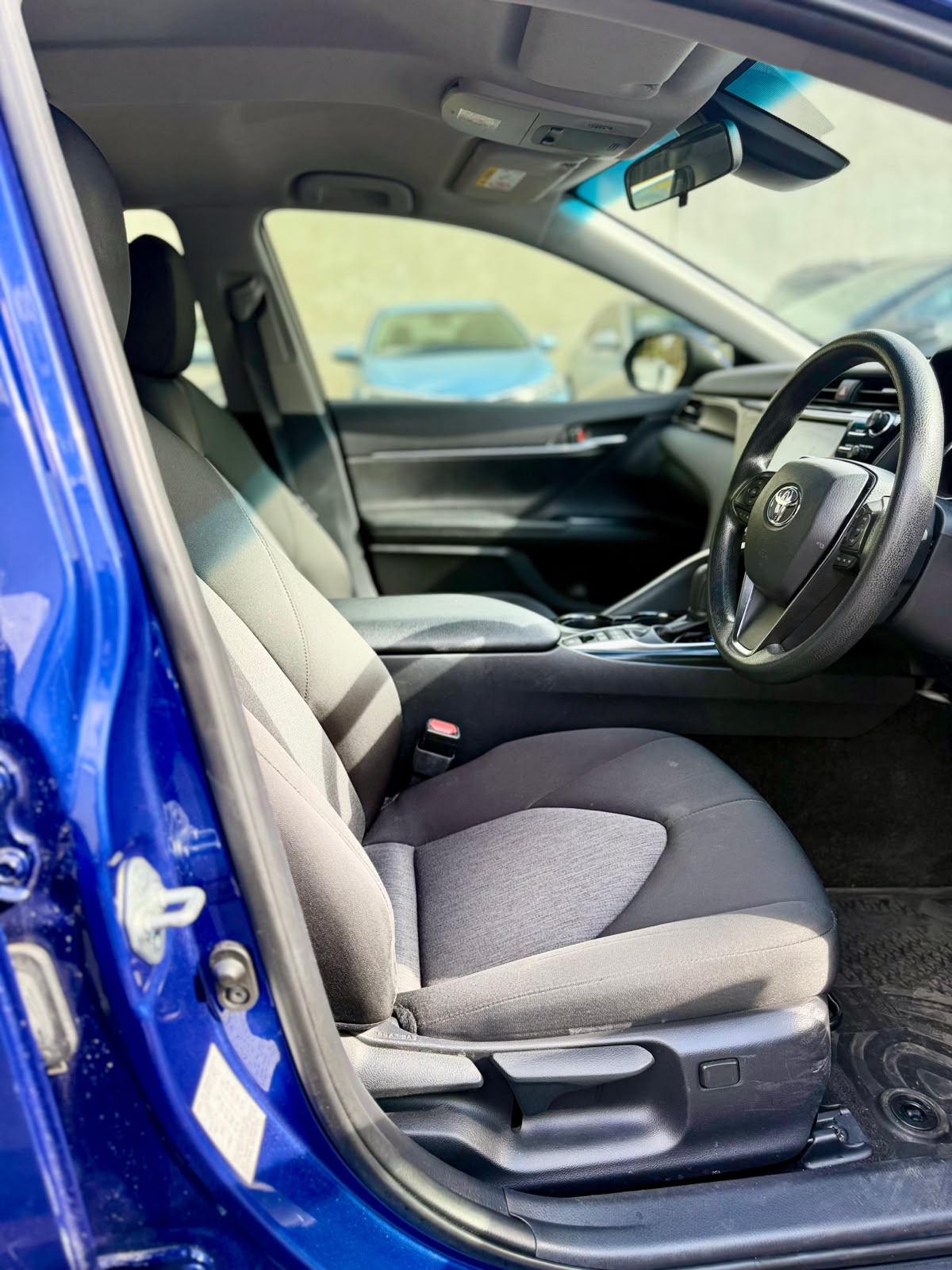 2020 Toyota Camry Ascent Hybrid Sedan in Blue.