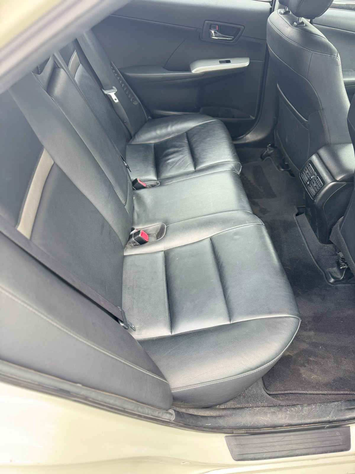 2013 Toyota Camry Hybrid HL Sedan in White.