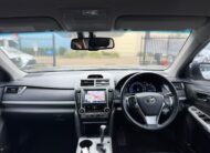 2013 Toyota Camry Hybrid HL Sedan in White.