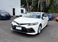 2021 Toyota Camry Hybrid Ascent Sedan in White.