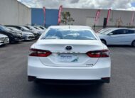 2021 Toyota Camry Hybrid Ascent Sedan in White.