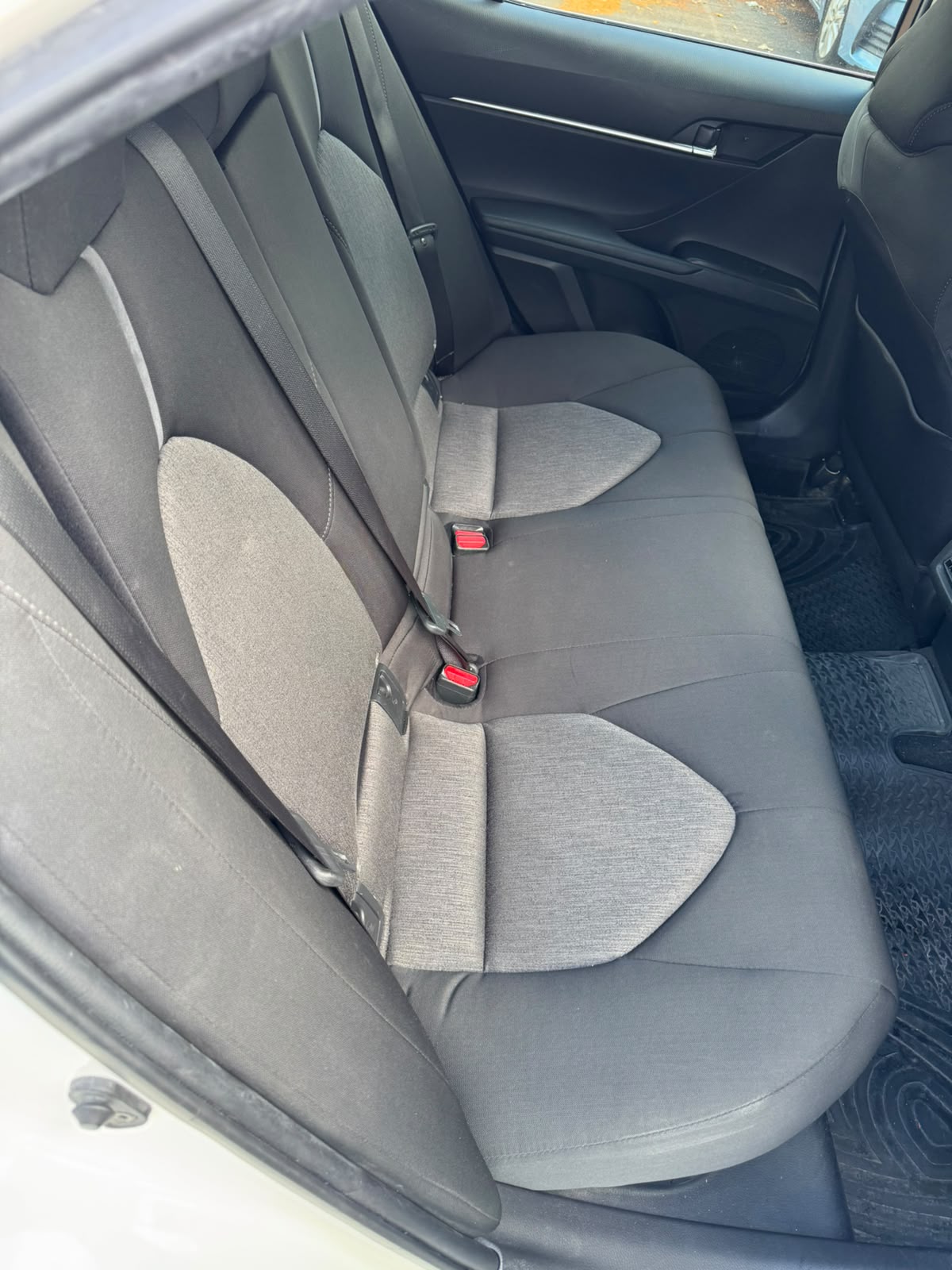 2021 Toyota Camry Hybrid Ascent Sedan in White.